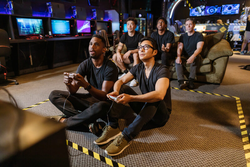 Young adults playing games together